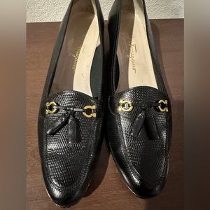 FERRAGAMO Icon black leather loafers with gold horse bit and tassels